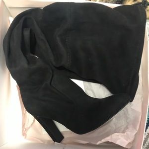 Black thigh high boots